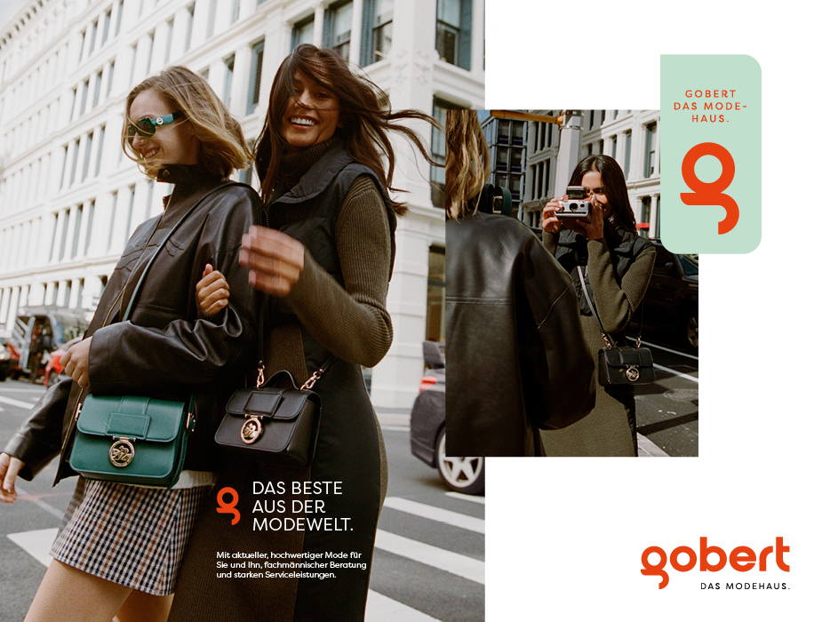 Editorial-Motiv mit zwei stilvoll gekleideten Frauen in der Stadt, kombiniert mit dem Logo und Markenauftritt des Modehauses gobert. Die Gestaltung zeigt das moderne Corporate Design.